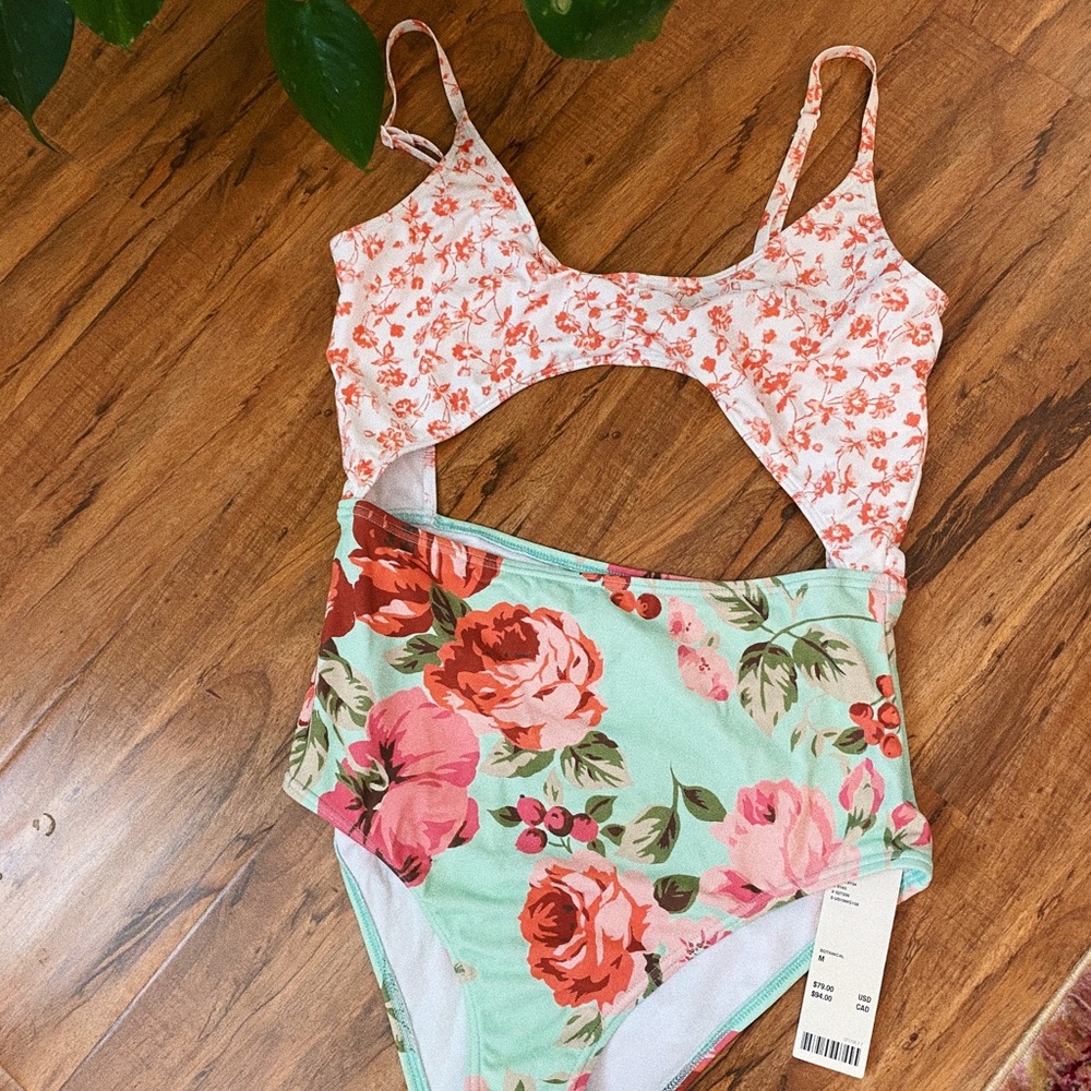 Adorable cut out one piece floral bathing suit!